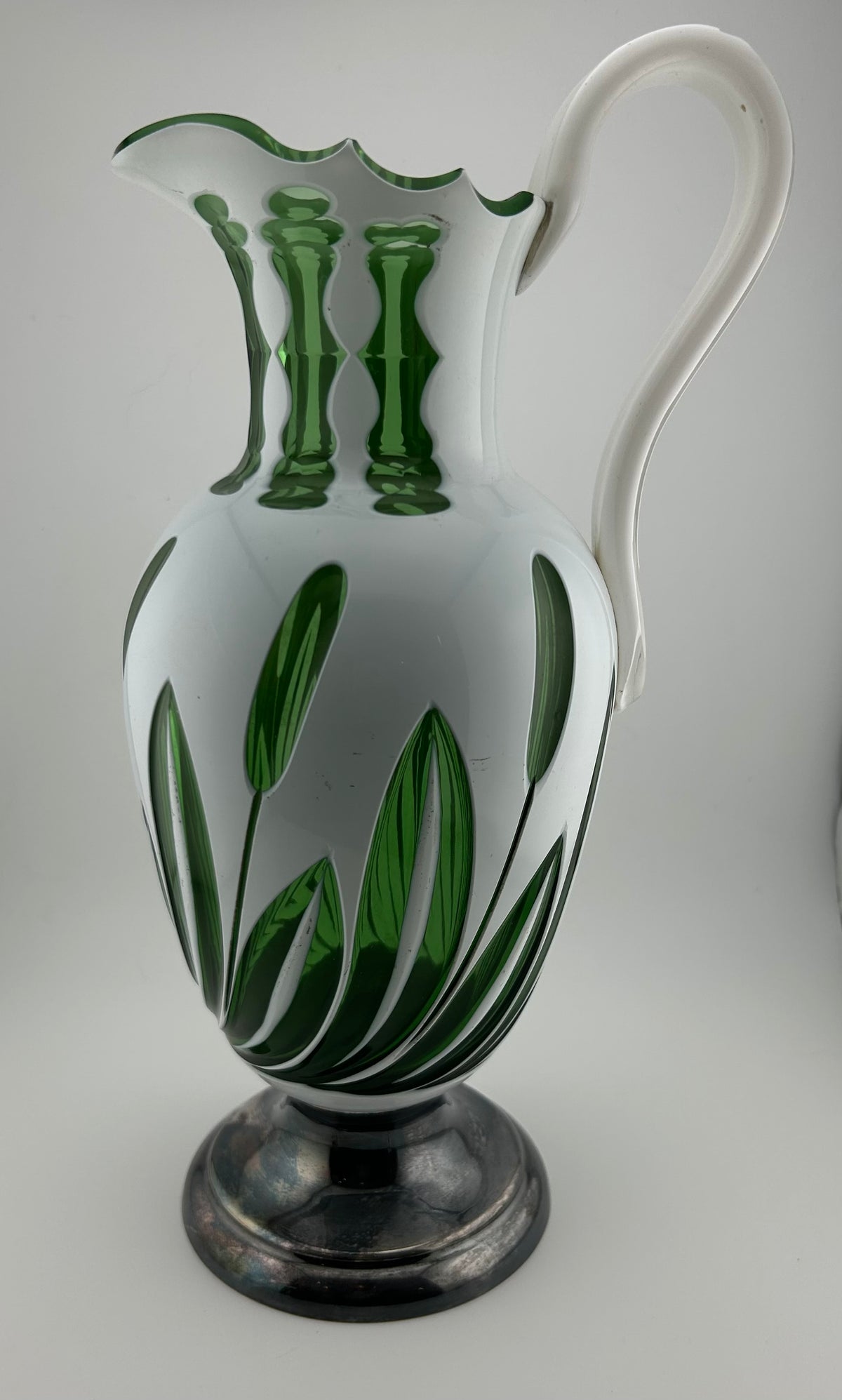 White Over Green Glass Pitcher with Cat Tail Motif and Silver Plate Base