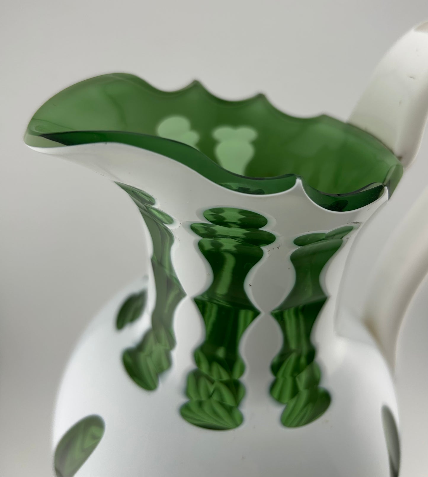 White Over Green Glass Pitcher with Cat Tail Motif and Silver Plate Base
